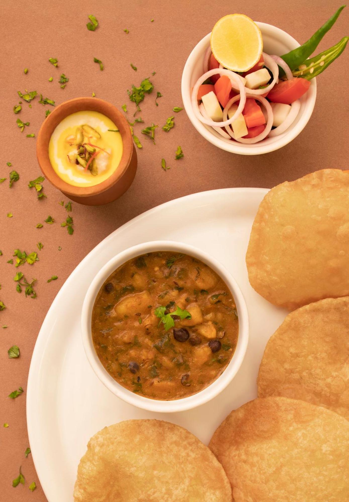 瓦拉纳西泰姬恒河酒店 外观 照片 Poori masala